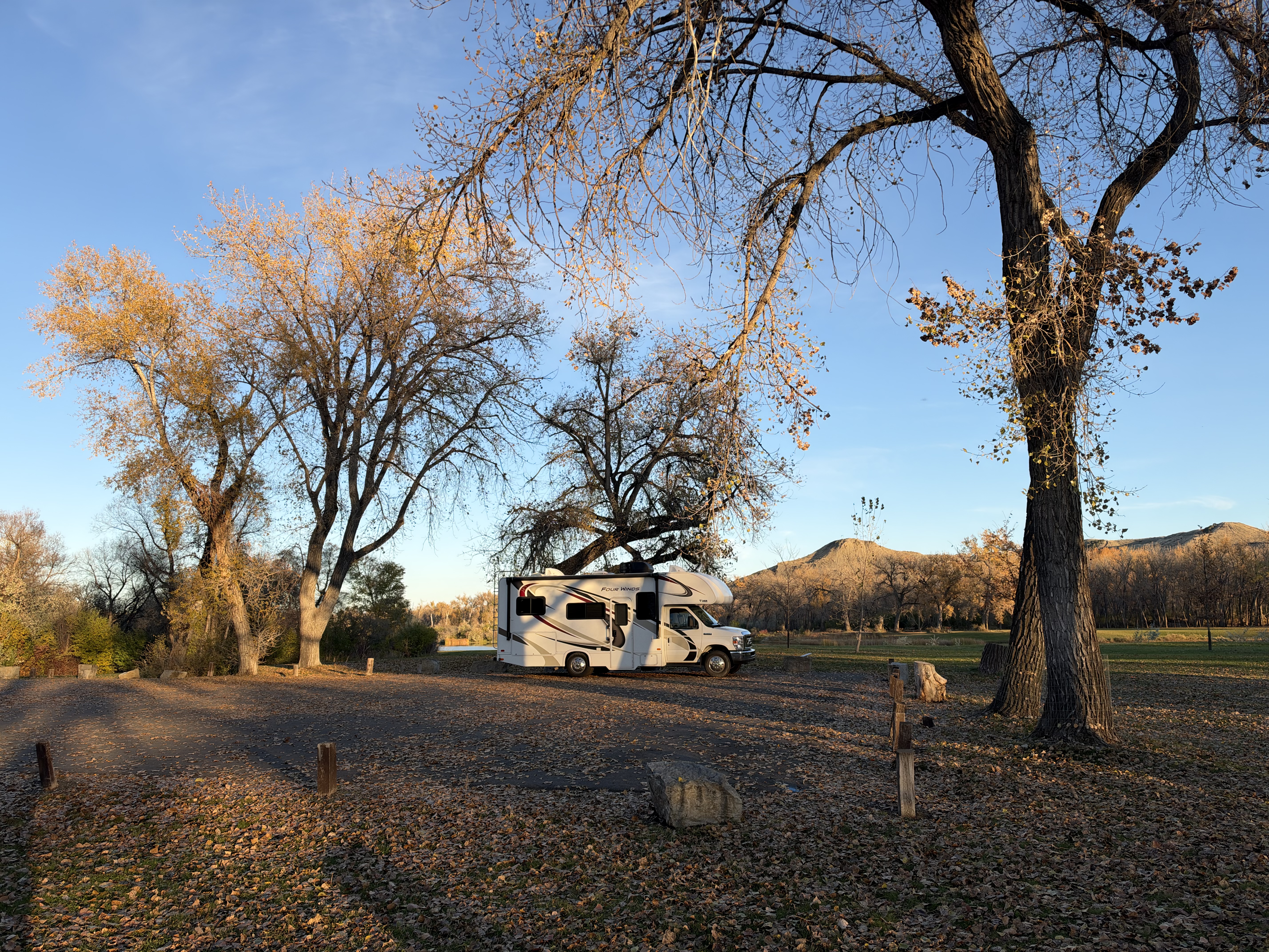 Class C motorhome in autumn campground